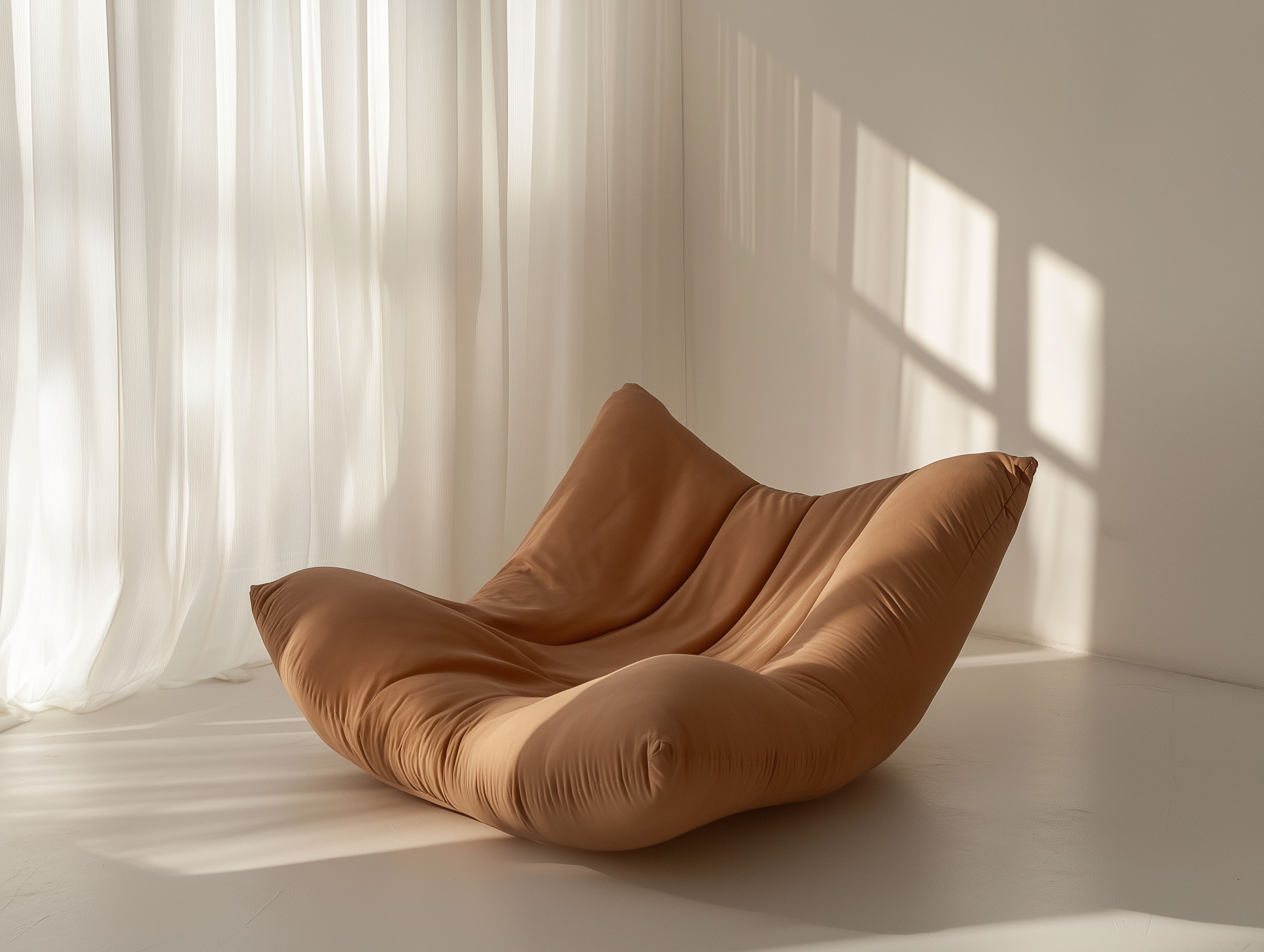 A comfortable lounge chair beside a sunlit window